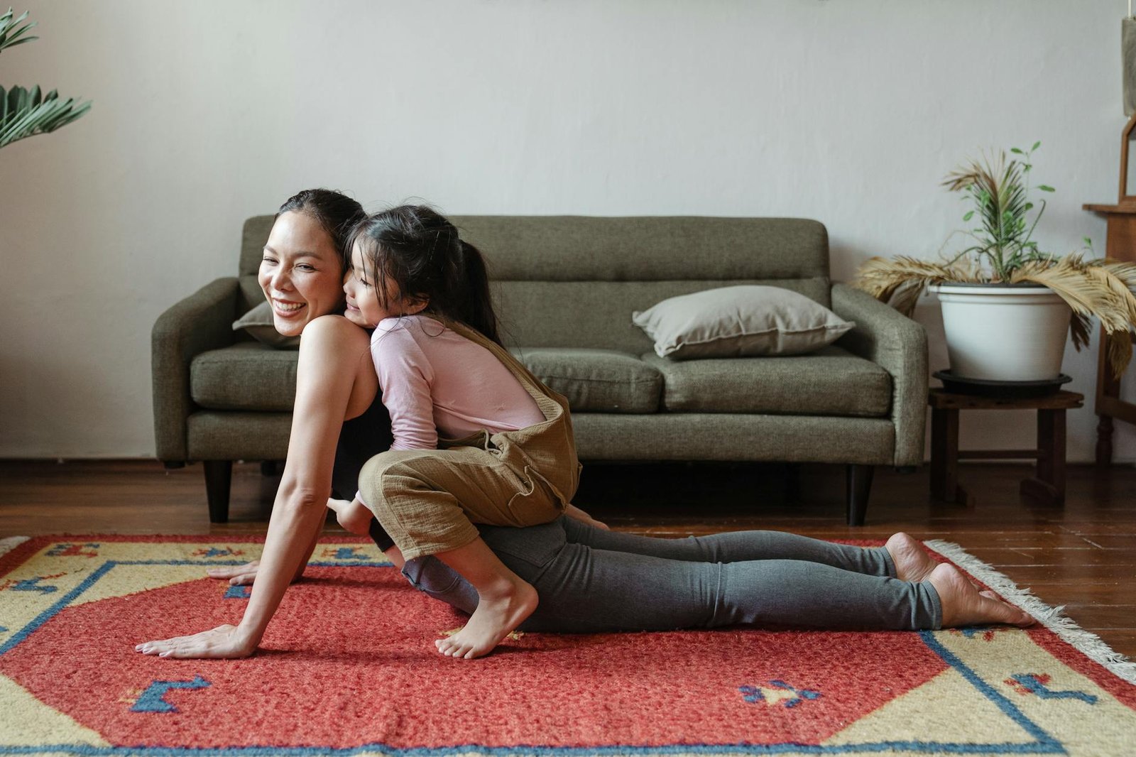 https://www.pexels.com/photo/photo-of-girl-hugging-her-mom-while-doing-yoga-pose-4473612/