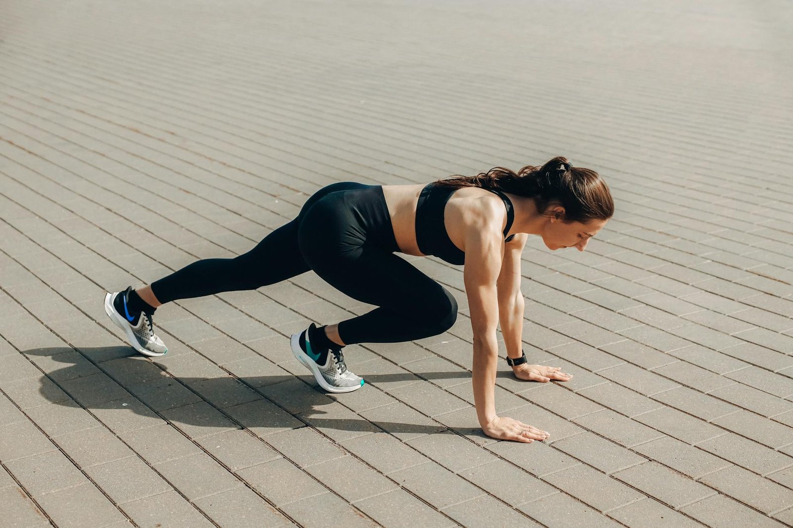 https://www.pexels.com/photo/woman-in-black-tank-top-and-black-leggings-doing-yoga-4775202/