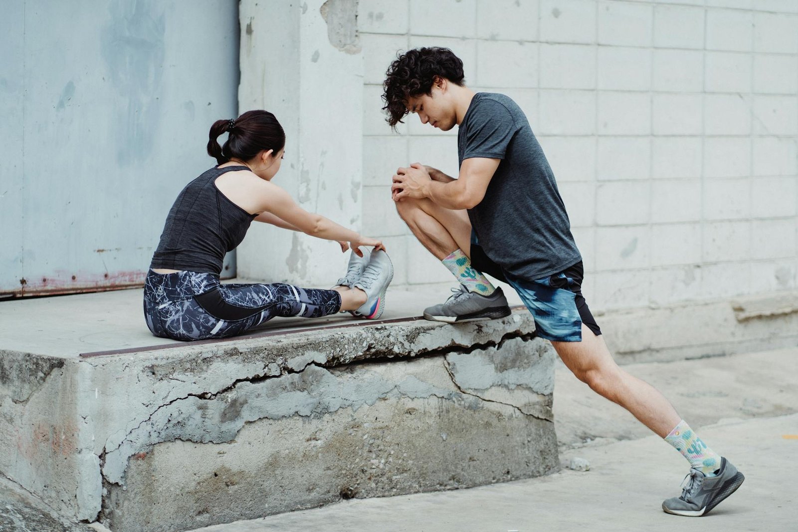 https://www.pexels.com/photo/man-and-woman-stretching-together-4852742/