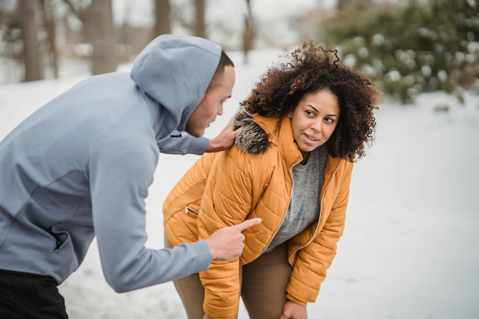 https://www.pexels.com/photo/plump-black-woman-and-coach-looking-at-each-other-in-winter-park-6455632/